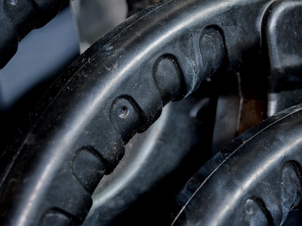 Stack of black rubber weight plates
